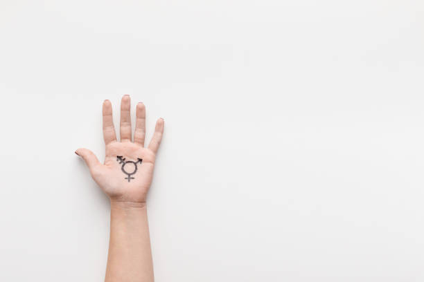 istock Transgender symbol painted on palm, copy space 1128237594