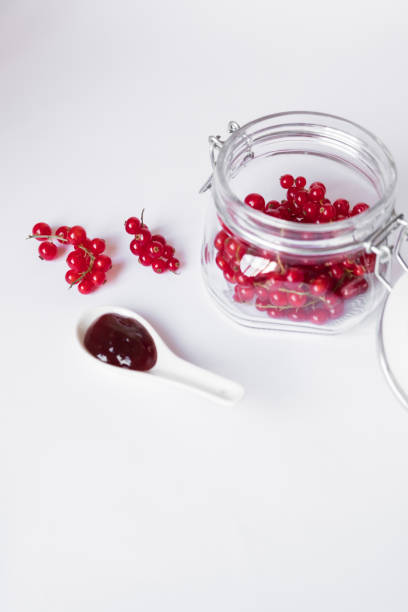 Red berries with jam stock photo