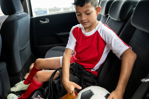istock Boy in the car after soccer 1128240917