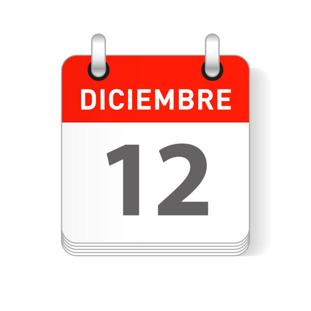 istock Diciembre 12, December 12 date visible on a page a day organizer calendar in spanish Language 1128241138