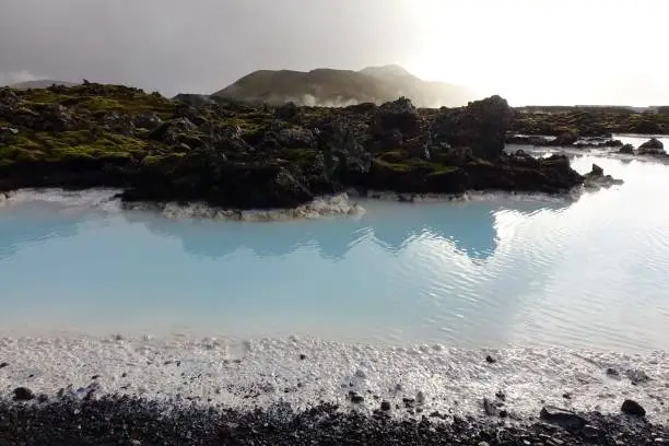 Sunset over geothermal waters of Blue Lagoon, in south of Iceland.