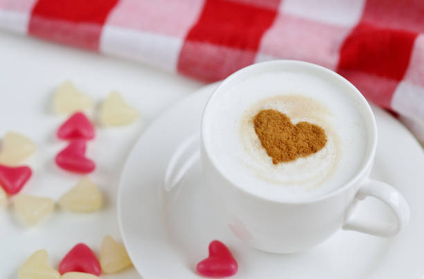 istock Cappuccino with heart pattern of cinnamon 1128244480