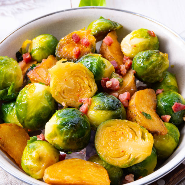 istock Roasted Brussels sprouts with honey and sesame from the oven 1128244732