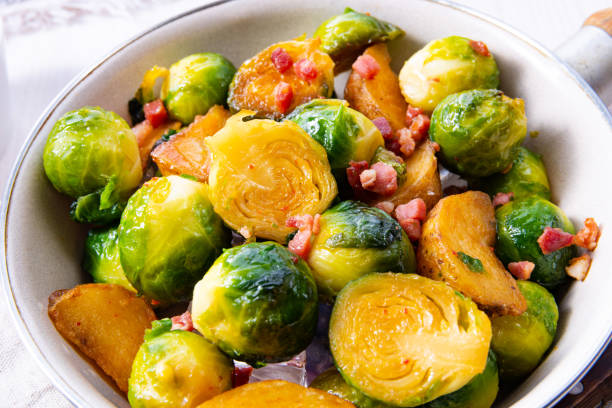 istock Roasted Brussels sprouts with honey and sesame from the oven 1128244798