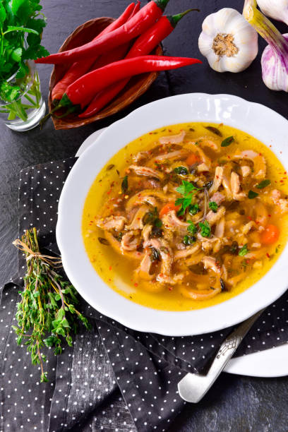 istock Traditional tripe soup in polish style with beef and vegetables 1128246136