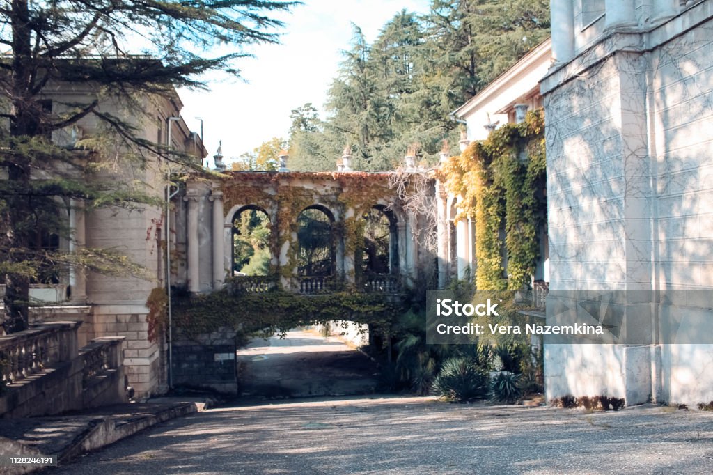 Beautiful abandoned, old building with columns Archaeology Stock Photo