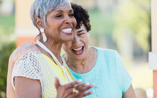 istock Multi-ethnic senior women laughing together 1128247553