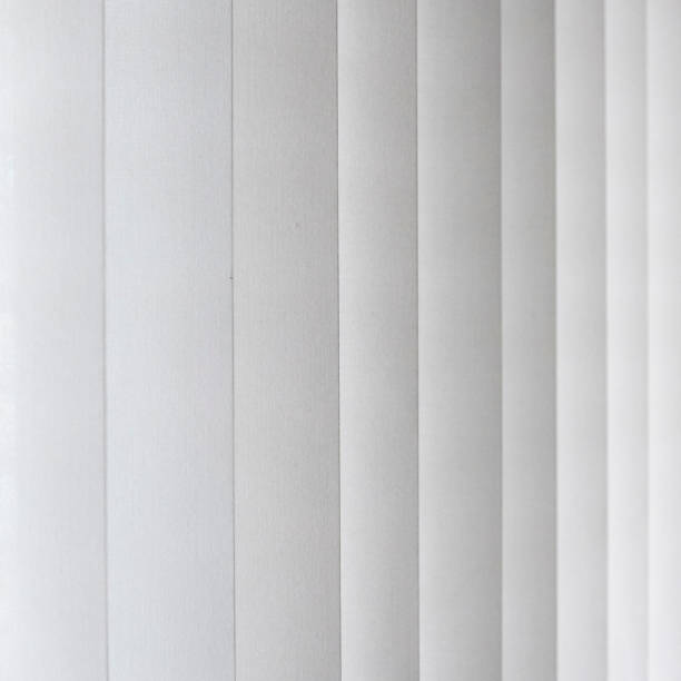 istock closed shutter of a curtain in grey color 1128248728