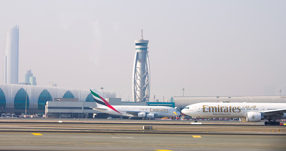 Dubai - October 23: Emirates Airplane at Dubai Airport on October 23, 2018 in Dubai, U.A.E. Dubai airport is home port for Emirates Airlines and one of the biggest world hubs