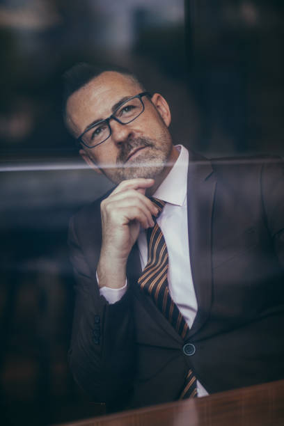 istock Stylish senior businessman 1128249213