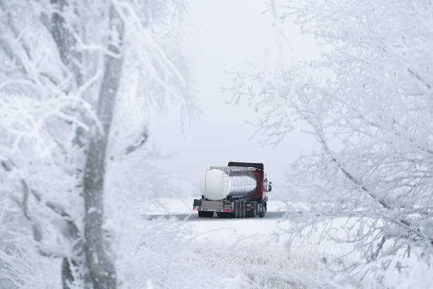 istock winter road transportation truck. 1128253697
