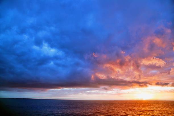 istock Scenic View Of Sea Against Dramatic Sky During Sunset 1128255543