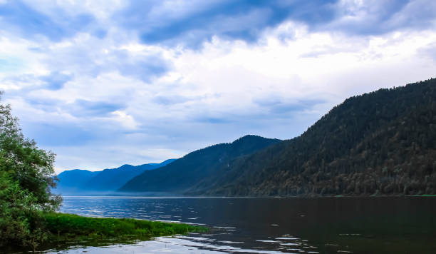 istock Lake in the mountains with cold water 1128257712