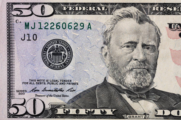 istock fragment of 50 dollar bill 1128259501