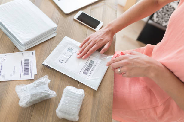 istock Female Small Busines Owner or Maker Shipping out Orders 1128259589