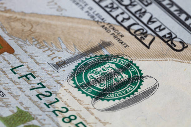 istock fragment of dollar bill 1128260238