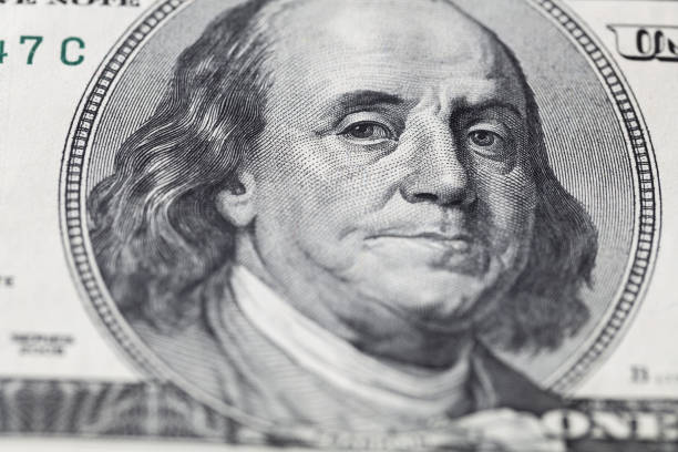 istock fragment of old 100 dollar bill 1128260378