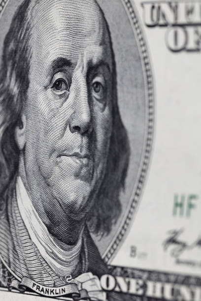 istock fragment of old 100 dollar bill 1128260379