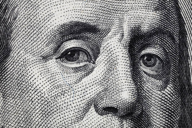 istock fragment of old 100 dollar bill 1128260434