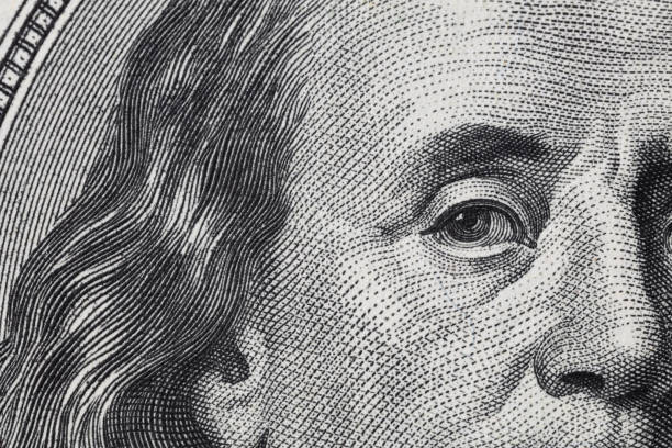 istock fragment of old 100 dollar bill 1128260435