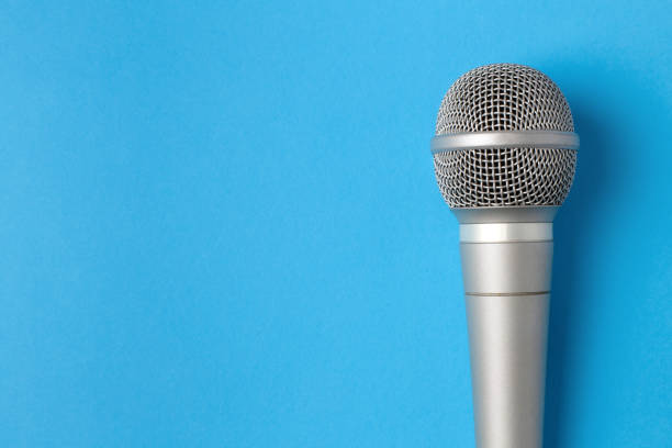 istock Microphone on blue 1128264958