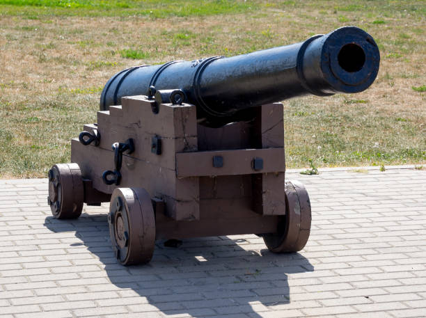 istock Old ship cannon on a wooden carriage 1128267698