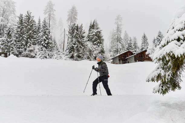 istock Tranquil scenery with snow- Man posing 1128268211