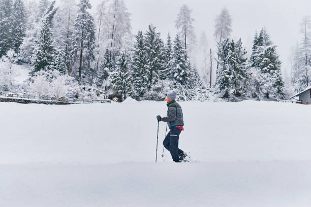 istock Tranquil scenery with snow- Man posing 1128268319