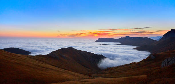 istock Beautiful landscape with mountains and sky 1128270331