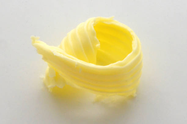 istock Roll of butter on an isolated background. P 1128272786