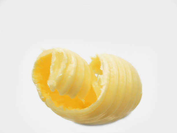 istock Roll of butter on an isolated background. 1128277216