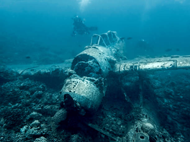 Jake Seaplane Wreck with Diver in Blue Ocean