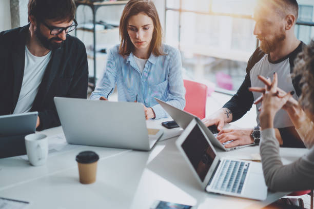 istock Happy Business people meeting concept.Blurred background.Horizontal. 1128280591