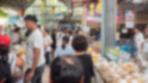 istock blur people at market 1128286896