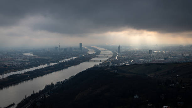 Dramatic sky over Vienna (Austria) and river Danube in winter as seen from Leopoldsberg