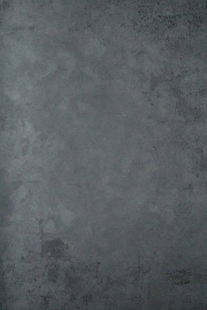 istock Monochrome dark texture with shade of gray color. 1128290818
