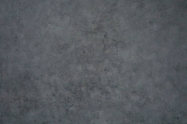 istock Monochrome dark texture with shade of gray color. 1128290956