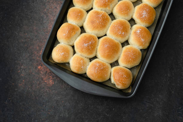 istock Top View of Baking Pan Full of Homemade Dinner Rolls 1128292064