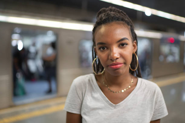 Afro latinx young woman portrait at metro station People lifestyle afro latinx ethnicity stock pictures, royalty-free photos & images