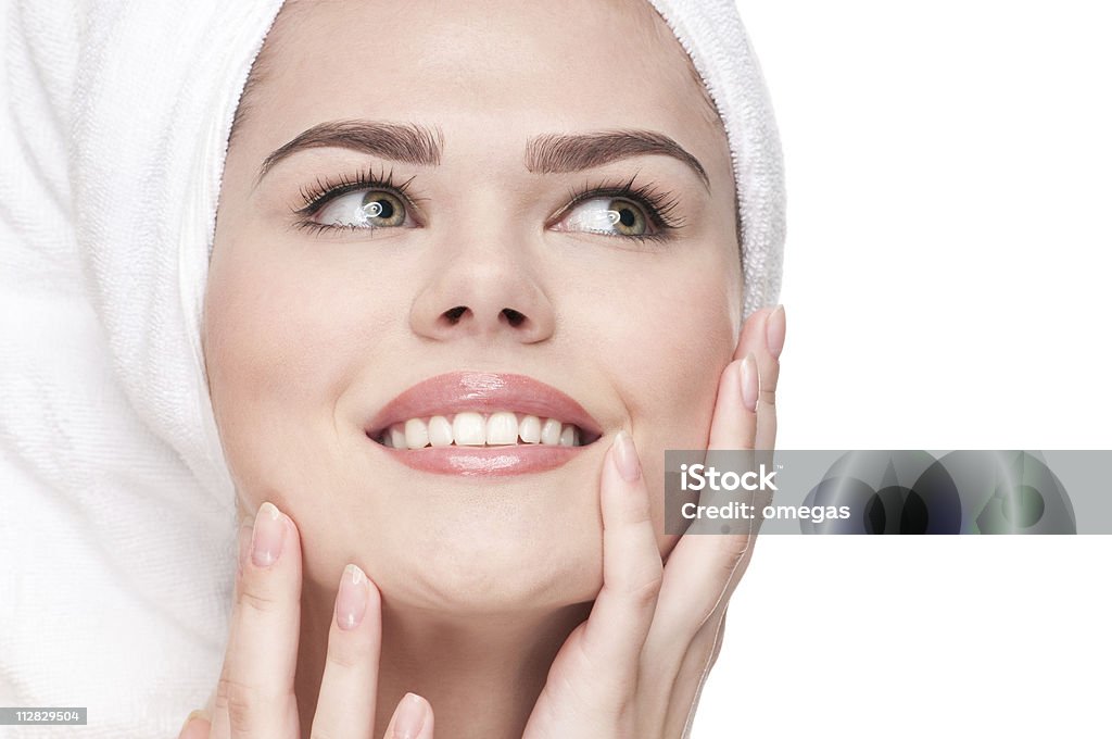 Close-up of woman with perfect health skin Close-up portrait of young adult woman with perfect health skin of face. Isolated on white. Adult Stock Photo