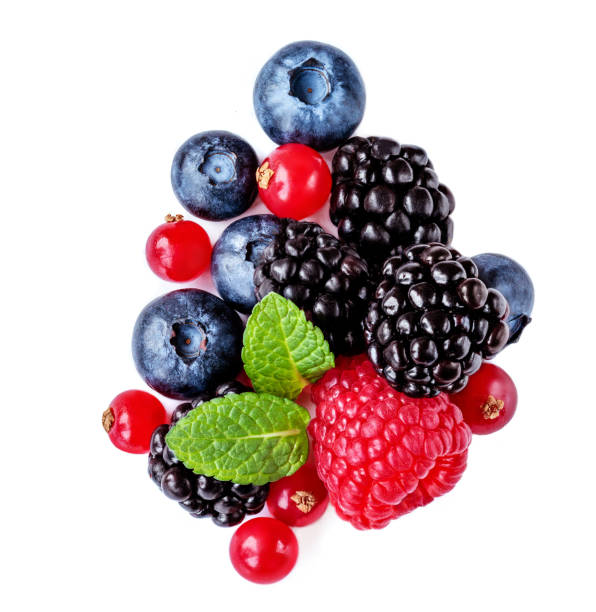 istock Isolated mixed berries. Raspberry, Blueberry,  Cranberry, Blackberry and Mint leaves on white background. Top view 1128295908