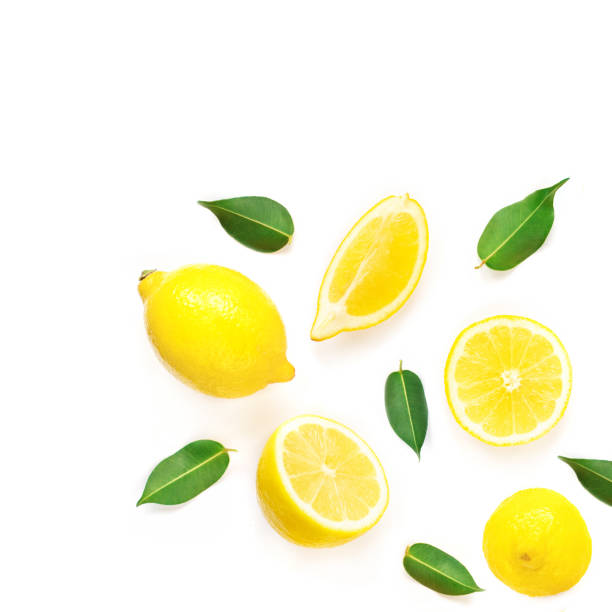 istock Lemon and slices with leaf isolated on white background. Tropical abstract creative Summer background.  Flat lay, top view. 1128296227