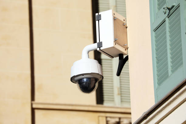 istock Dome Type Camera On The Wall Of The Building 1128297158