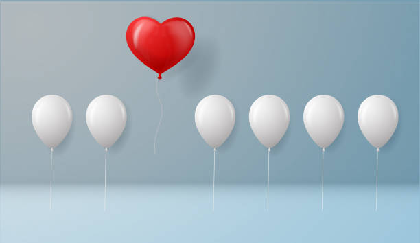 istock Stand out from the crowd and different concept One red heart balloon flying away from other white balloons on wall background with shadows.success concept 1128297426