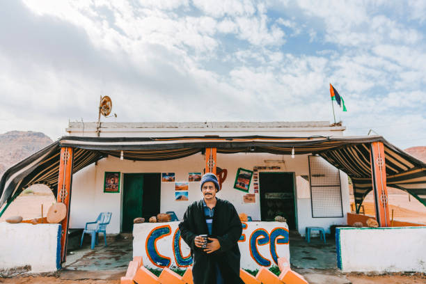 Wadi Rum, Jordan December 09, 2018: Authentic bedouin man  standing near the coffee house