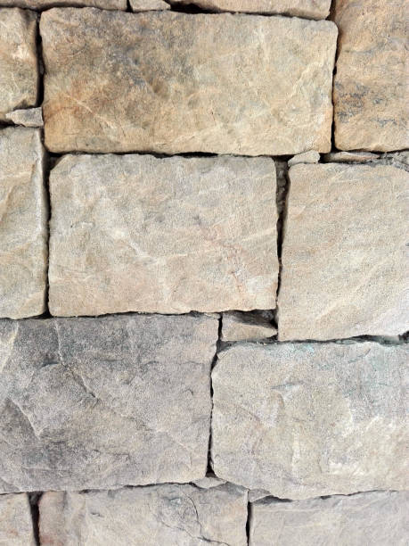 Stone wall Wall formed by stone blocks capas superpuestas stock pictures, royalty-free photos & images