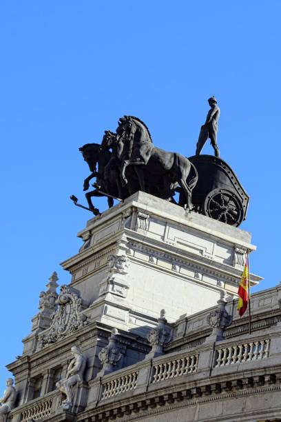 istock Horse and chariot sculptures 1128312694