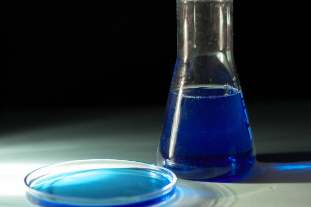 istock Flask for chemical experiments with green liquid 1128320265