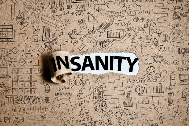 istock SANITY and INSANITY / Torn cardboard paper (Click for more) 1128321853