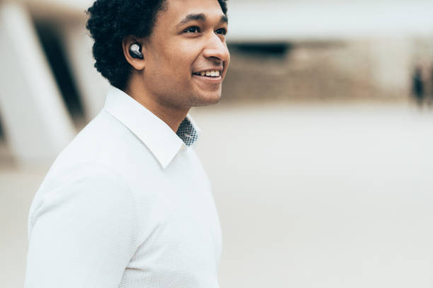 istock Portrait of Young man with Wireless earbuds 1128324329